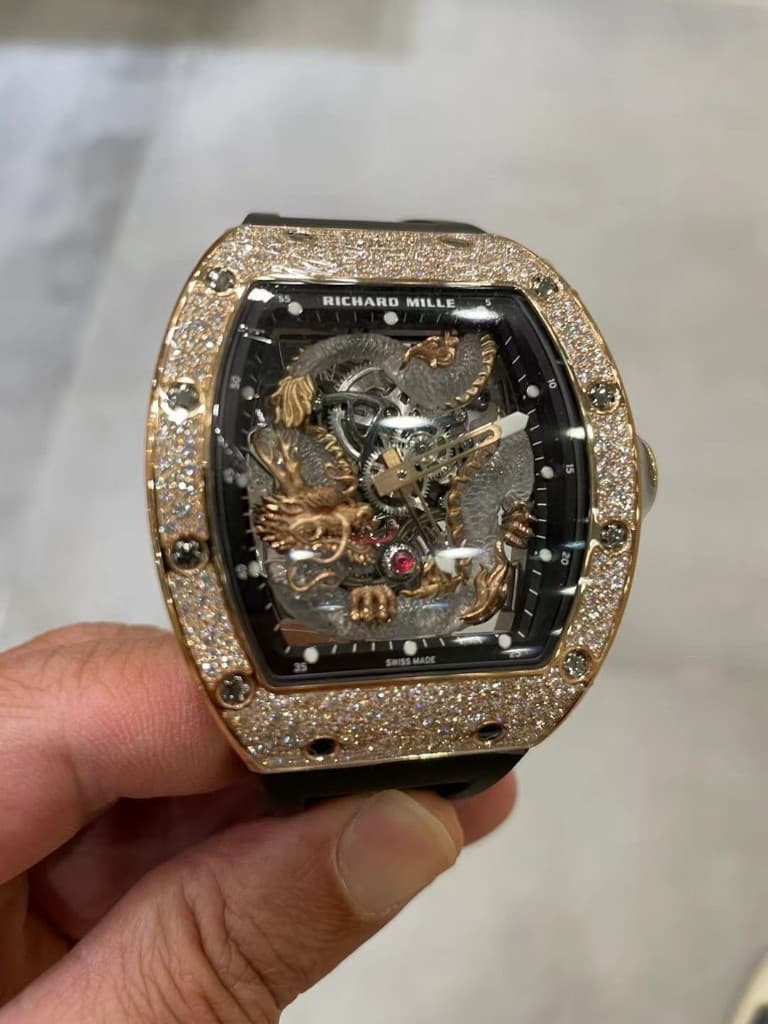 Richard Mille Dragon in rose gold with pavé diamond bezel, held at Exclusive Masterpiece Dubai